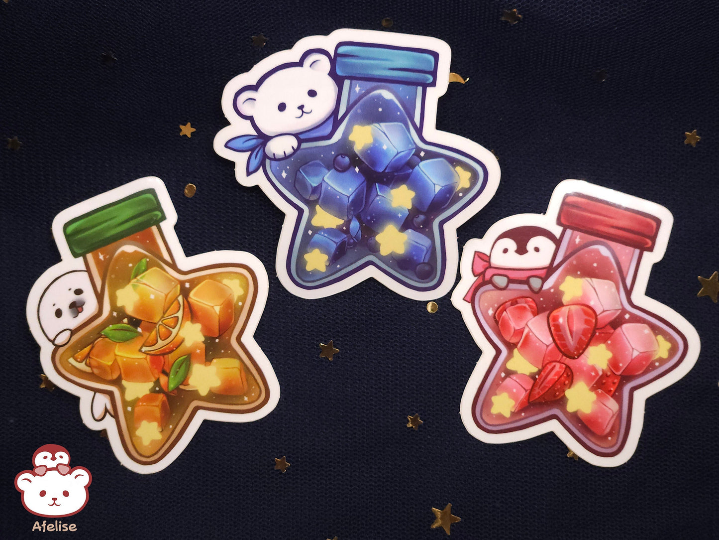 Three colorful star-shaped bottle stickers with animal companions on a dark background